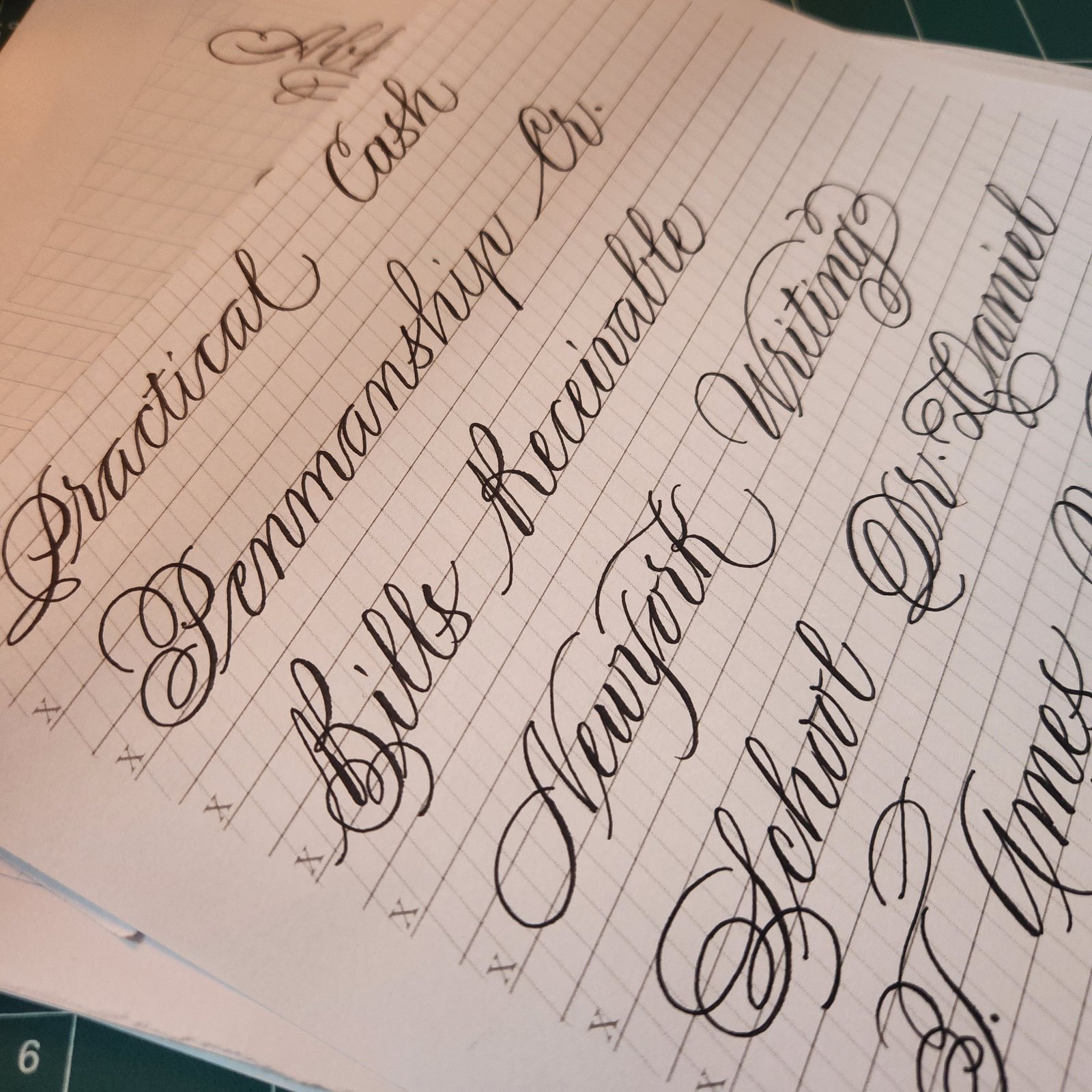 Ornamental penmanship exercises with flourished capitals, including Practical Penmanship and Bills Receivable